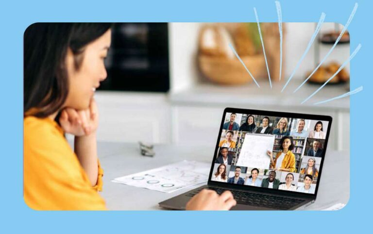 Female caregiver looking at learning tools for people with a dissability on her laptop.